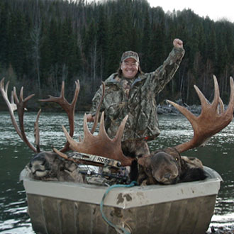 Keith Mark with a Trophy Caribou and Monster Bull Moose